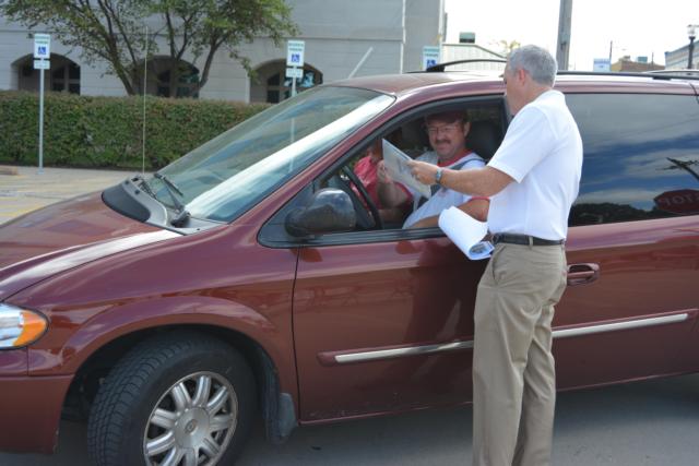 Tom Gibbons passes out info about the Drug Take-Back program.
