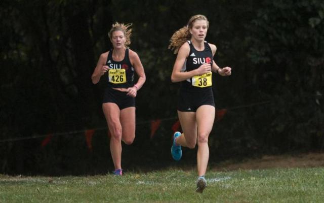 Southern Illinois University Edwardsville's Allie Sweatt, left, ran one of her best college races Saturday at SIUE with a time of 23:27.8 overall.