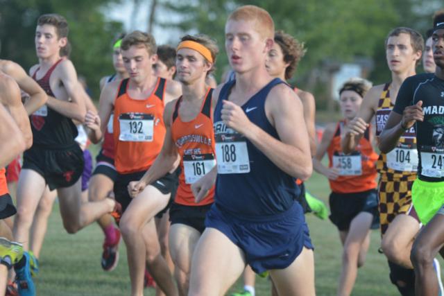 McGivney's Ross Bushur heads a pack of runners. (Photo by Dan Brannan)