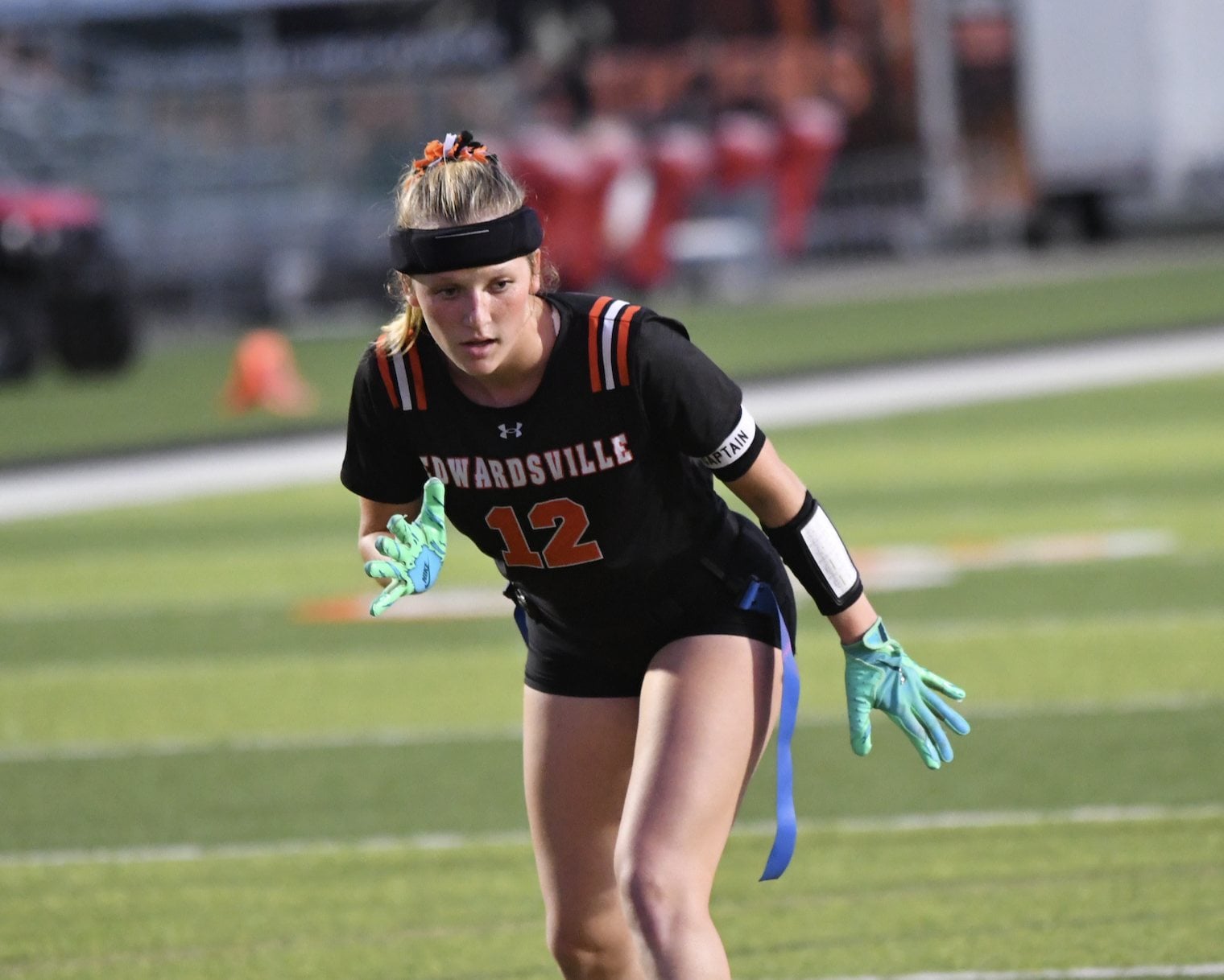 Serena Shapiro prepares to run a play in the Wednesday night contest against Belleville East. (Photo by Dan Brannan).