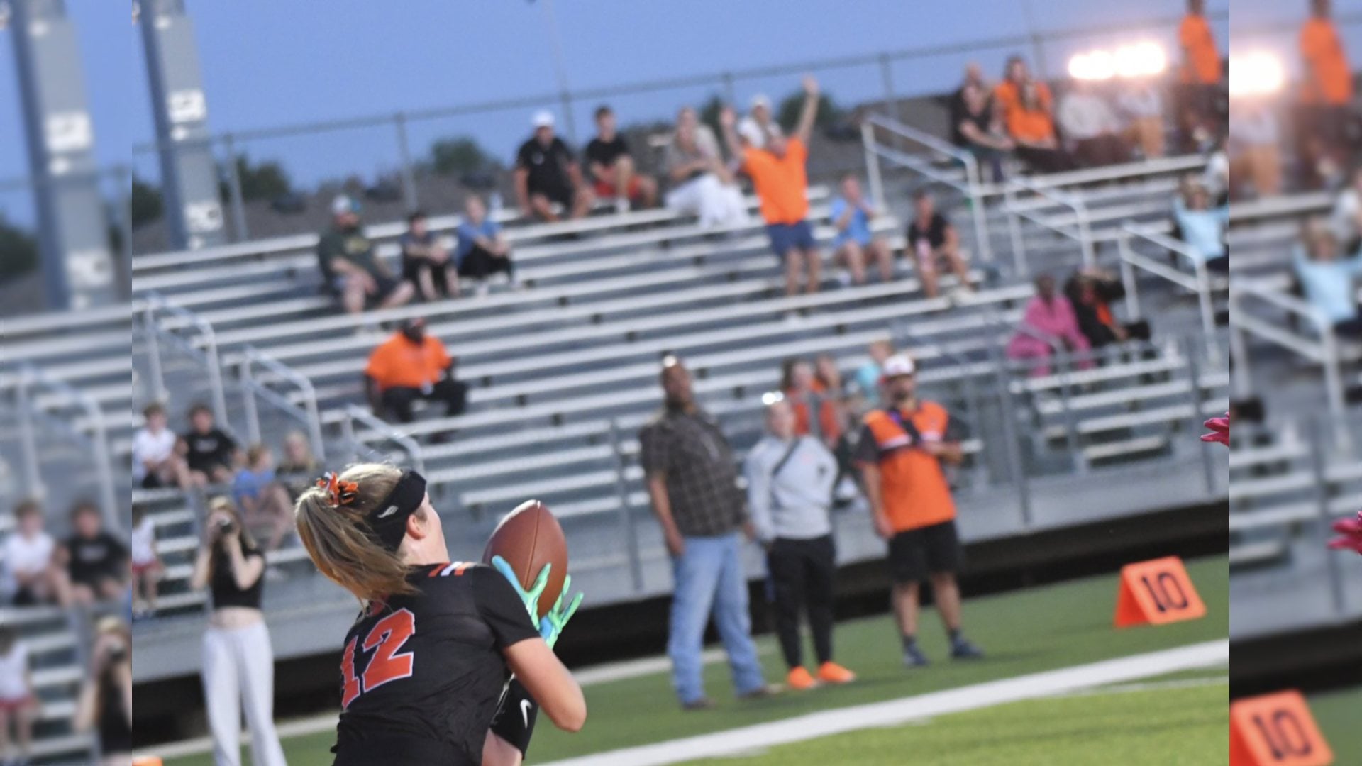 Serena Shapiro hauls in a touchdown score against Belleville East on Wednesday night. (Photo by Dan Brannan)