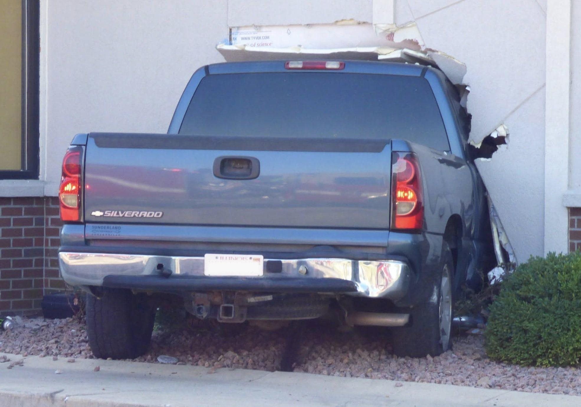 Two additional photos (top and bottom) by William Roe of a truck that crashed into the Wood River Taco Bell.