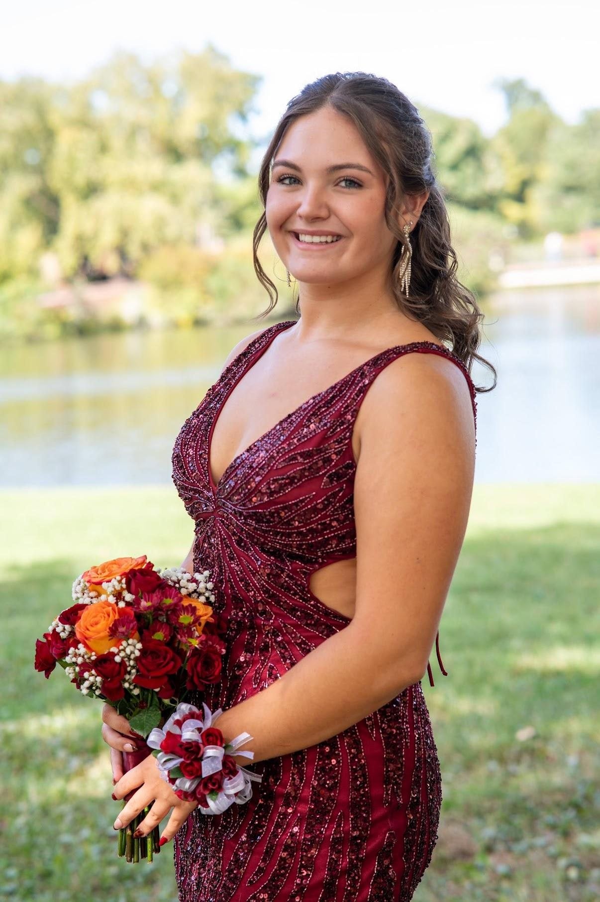 Mady Holcmann.