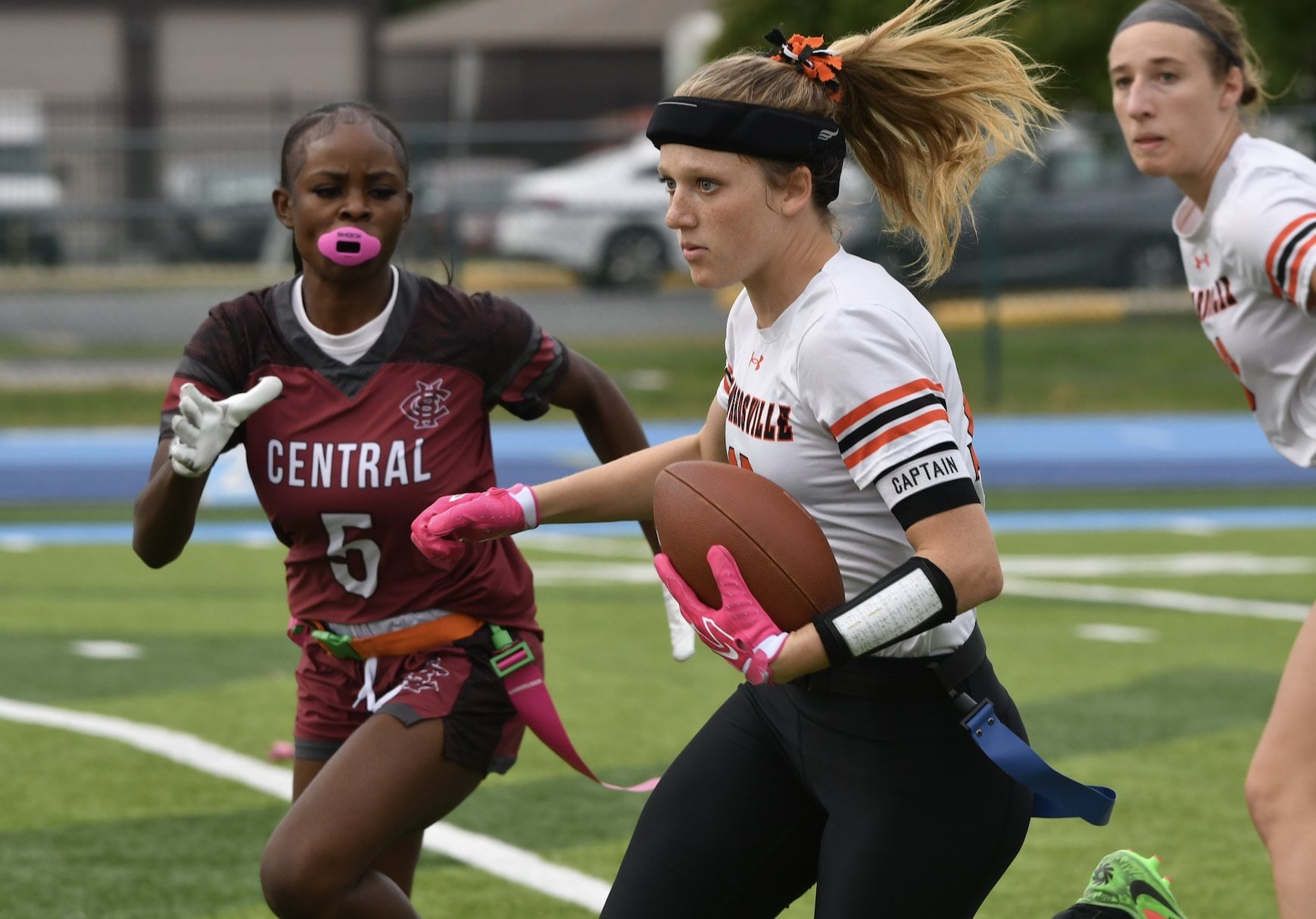 Serena Shapiro, a multi-purpose standout for the Edwardsville High flag football team. She is shown punting below.