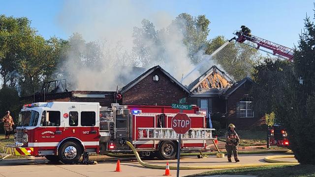 Another view of the scene on Seasons Drive. (Photo by Steve Schuenke).