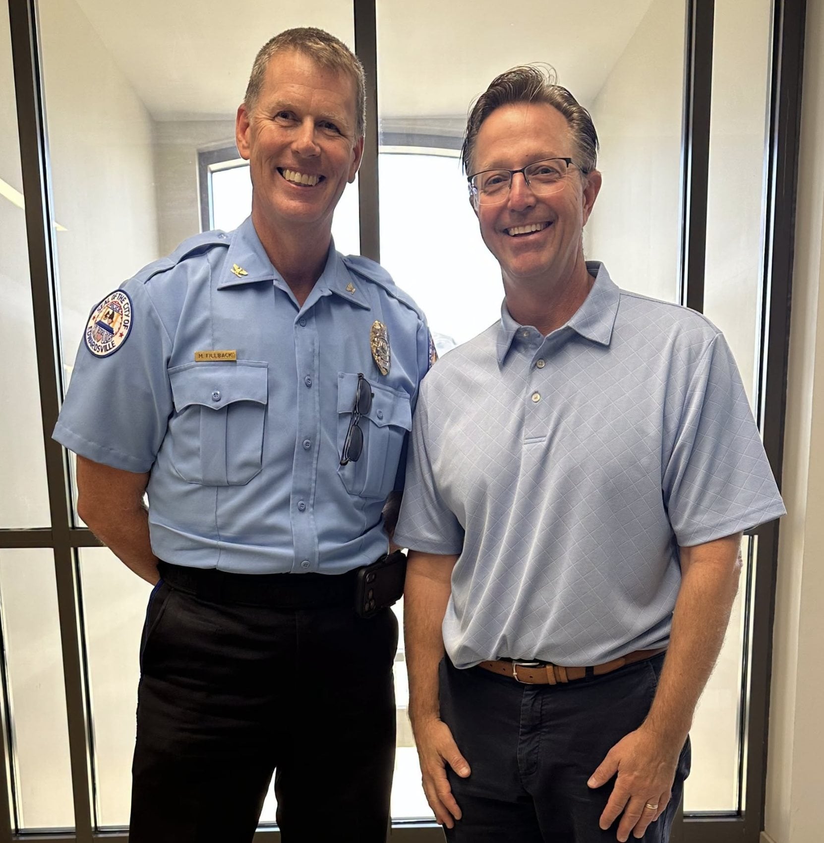 Retired Chief Michael Fillback and Edwardsville Mayor Art Risavy.