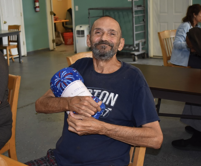 One of the Bingo winners with prize,