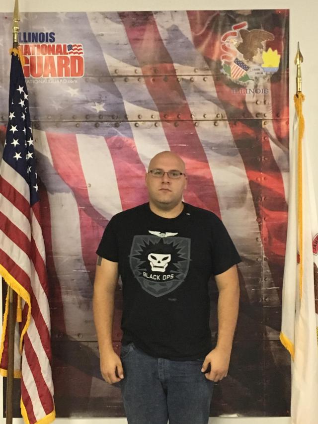 Pvt. Jordan Livingston of Mascoutah, Illinois, poses at the St. Louis Military Enlistment Processing Station in St. Louis, Missouri, Set. 21. Livingston enlisted as a 12N, Heavy Equipment Operator. (U.S. Army photo courtesy of Illinois Army National Guard Recruiting and Retention Command)