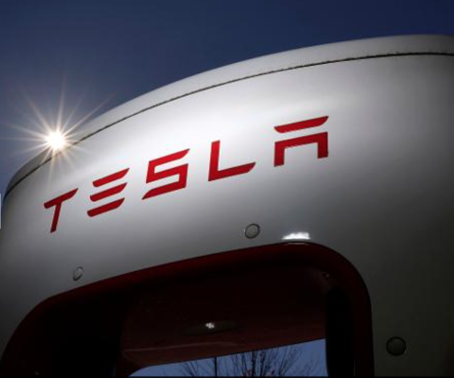 A photo of Tesla signage. (Associated Press)