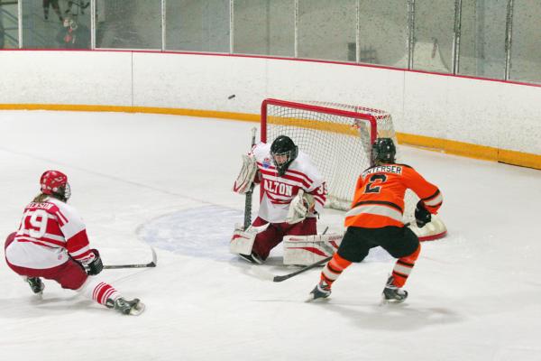 Edwardsville's Tyler Hinterser goes for a goal in the game against Alton on New Year's Day night.