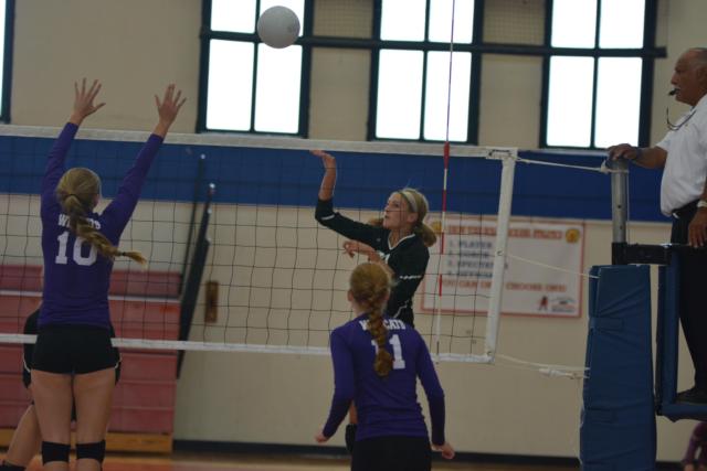 Emma Baalman taps the ball over for Calhoun in an earlier game. Calhoun is rolling going into the post-season, with only two losses to go with 29 wins.