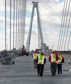 Madison County officials head west across the new Stan Musial Veterans Memorial Bridge being built across the Mississippi River. Madison County officials head west across the new Stan Musial Veterans Memorial Bridge being built across the Mississippi River.