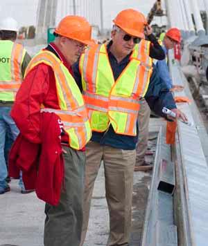 Chairman Alan Dunstan and MCT Managing Director Jerry Kane inspect the safety barriers to be installed on the new Stan Musial Veterans Bridge. Chairman Alan Dunstan and MCT Managing Director Jerry Kane inspect the safety barriers to be installed on the new Stan Musial Veterans Bridge.
