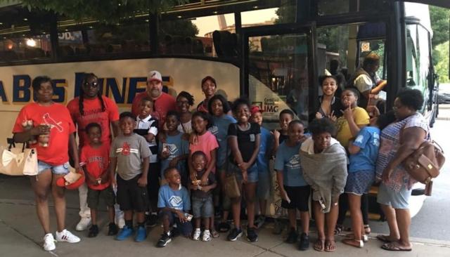 Boys & Girls Club members in front of the bus!!