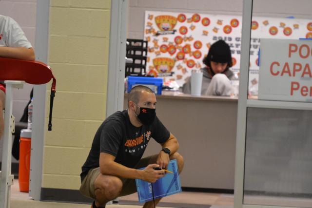 Edwardsville head girls swim coach Christian Rhoten has had extraordinary success since establishing the Tigers' program. His team captured their seventh consecutive sectional title this past Saturday.