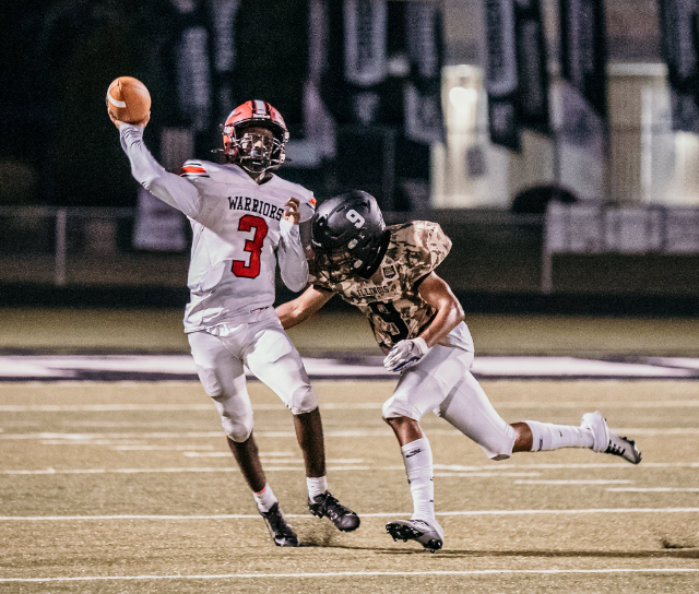 Kendrick Lyons prepares to pass to a teammate. (Photo by Mike Watkins Photography)