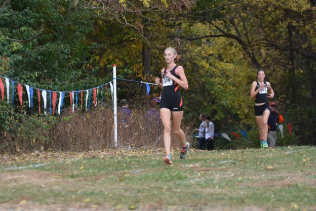 Rachel Schonecker leads a pack of Edwardsville runners in the regional meet at Southern Illinois University Edwardsville this past weekend.