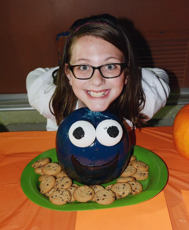 2nd Place Winner is Ella Lammare of the Vines 10-13 and her cookie Monster Pumpkin.