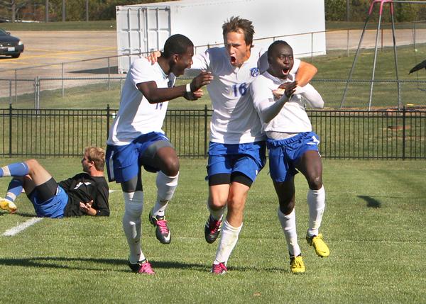 Frederik Bladt (16), center, grips teammates Melvin Beckett (10), right, and Damilol Akano (14), left, in celebration after the Trailblazers won their regional quarterfinal game Saturday, Oct. 26 at home. Beckett scored the winning goal with an assist from Justin Stoddart to defeat Southwestern Illinois College 1-0 in double overtime. Photo by S. Paige Allen, Lewis and Clark Community College photographer.