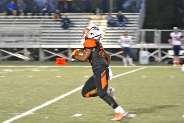 Dionte Rodgers is off to the races for a 55-yard touchdown score in the first period. (Photo by Dan Brannan)