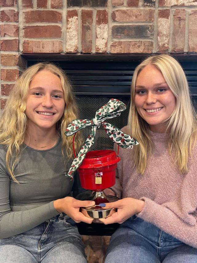  Pictured Lily Freer, left and Taylor Freer are getting ready to place one of the counter kettles around town. If you would like a counter kettle please call the Salvation Army office..