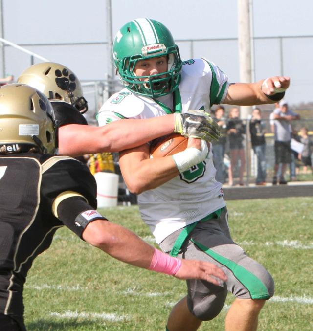 Smith being chased by Camp Point Central defenders.