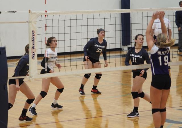 Calhoun's Junie Zirkelbach (14), Sophie Lorton (1), Jessica Oswald (22), and Emily McBride.
