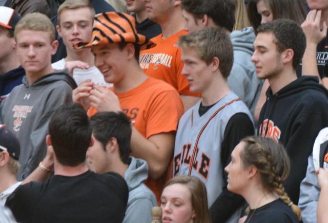 This Tiger fan in a rare hat and his fellow Edwardsville cheering section mates enjoyed Tuesday's win over East St. Louis. (Photo by Dan Brannan)