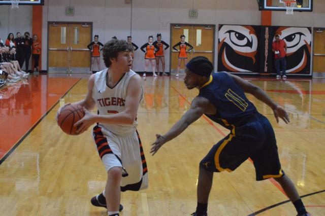 Jack Marinko controls the ball for the Tigers against O'Fallon. (Photo by Brent Feeney)