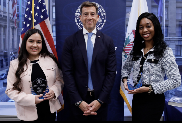  Secretary Giannoulias awards Jocelyn Solis (left) and Amari&rsquo;ah Carter (right) the 2025 Illinois John Lewis Youth Leadership Award. 