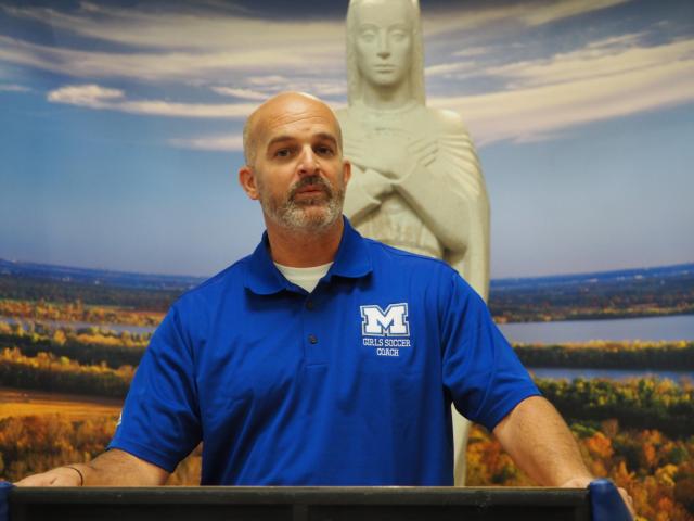 Brian Hoener being introduced as the new coach at Marquette High School.