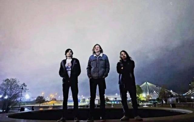 Cameron Goewey (guitar and vocals) (left), D.J. Redden (bass) (center) and Tyler Bush (drums) (right).