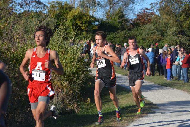 Alton's Arie Macias is slightly ahead of Edwardsville's Dan Powell in a recent race.