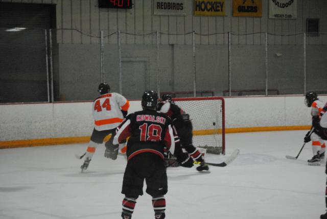 Edwardsville's Tyler Schaeffer (44) shoots for a goal last season. 