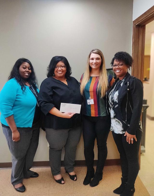 NeTia Powell, Urban League’s Kesha Chatman, Kassi Heimann and Vanessa Martin presenting check to Urban League of Metropolitan St. Louis, courtesy of DraftKings at Casino Queen