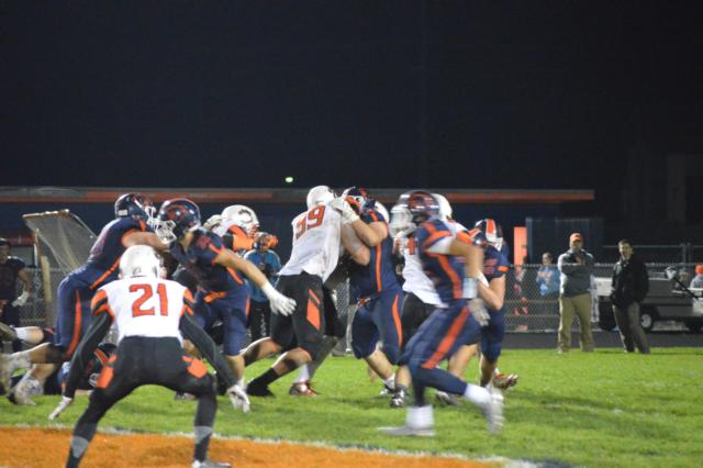 A.J. Epenesa stacks up the Oswego offensive line on Saturday.