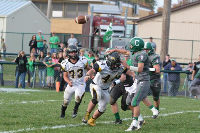 Carrollton's Wade Prough lets loose of a pass on Saturday. (Photo by Dan Brannan)