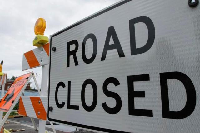 Road construction signs are seen Monday, April 30, 2012 in Springfield, IL.