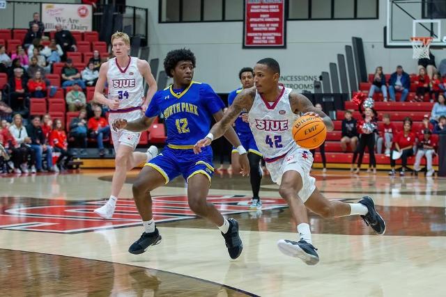 Shamar Wright drives to the basket against North Park Thursday night inside First Community Arena in Edwardsville. (Photo by Scott Kane)