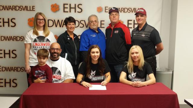 Front row from left - Liam Henricks (brother), Bill Henricks (dad), Jordyn Henricks, Stacey Hughes (mom) Back row: Lisa Henricks, Lori Blade, Jim Greiner (pitching coach), Darren Zobrist (Jordyn's coach with the Black Widows select team) and Charlie Kennedy (Lindenwood-Belleville softball coach)