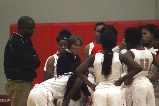 Tammy Talbert talking to her team in a timeout. Photo by Steven Spencer.