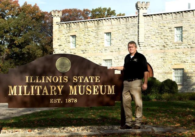 Col. (ret.) Paul Fanning, of Chesnut, Illinois, stands outside of the Illinois State Military Museum in Springfield, Illinois. Fanning was recently selected as the new director for the museum after retiring from the Illinois Army National Guard. Fanning served more than 30 years in the Guard and said he is very excited and sees his new job as an opportunity to continue to serve. (U.S. Army photo by Sgt. 1st Class Bryan Spreitzer, Illinois National Guard Public Affairs)