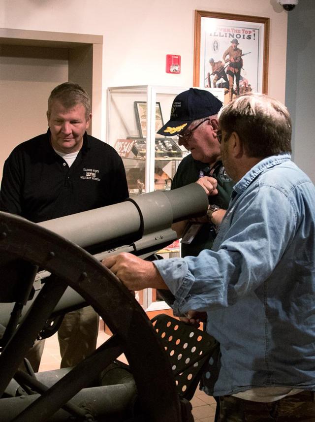 Col. (ret.) Paul Fanning of Chesnut, Illinois, talks to volunteers from the living history detachment, who Fanning says are an integral part of the museum team, at the Illinois State Military Museum in Springfield, Illinois. Fanning was recently selected as the new director for the museum after retiring from the Illinois Army National Guard after more than 30 years of service. Fanning will manage day-to-day operations at the museum and looks to grow the museum with help from the museum team. (U.S. Army photo by Sgt. 1st Class Bryan Spreitzer, Illinois National Guard Public Affairs)