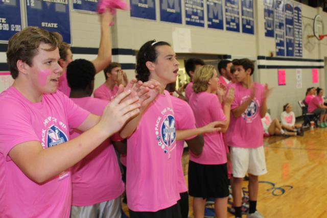 Students cheer during the 3rd annual Volley for the Cure at Marquette Catholic High School.