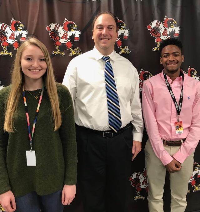 Pictured from left to right: Gwen Hunter, Art Fahrner of Edward Jones, Cassius Havis.