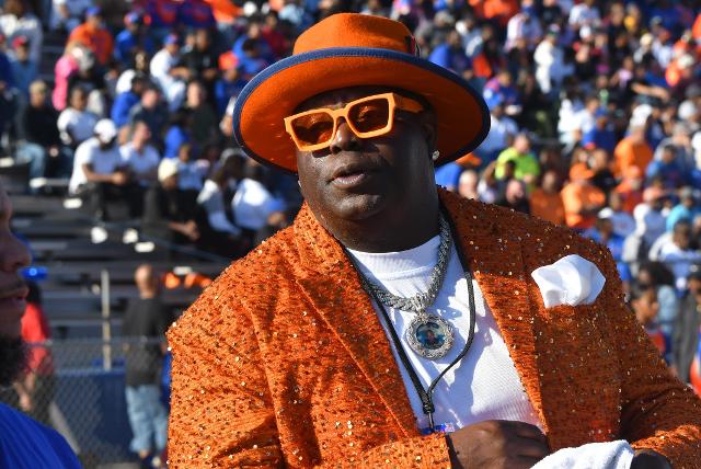 The perfect image of a devoted Flyers supporter on the sidelines.