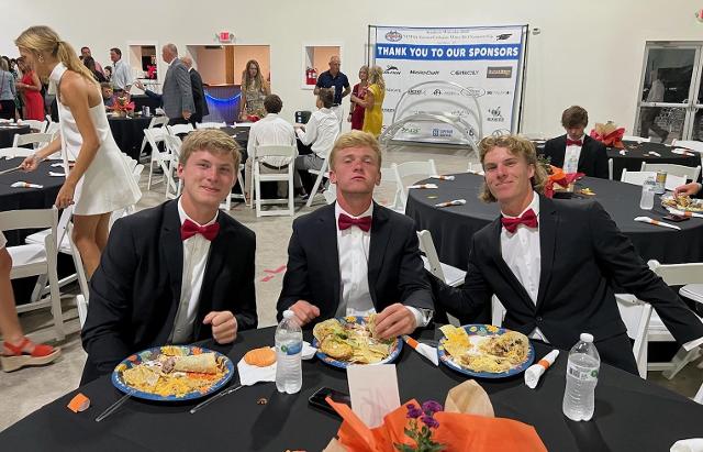 Left to right, Edward Roberts, Will Stackpole and Will Roberts at the National Collegiate Water Ski Association Championship banquet.