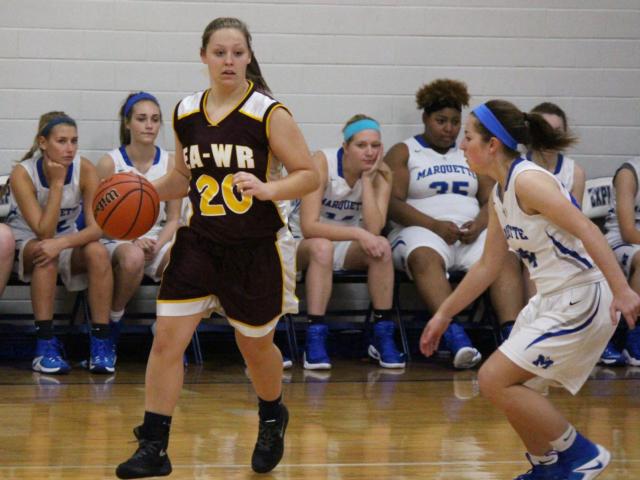 Kayla Brantley dribbles the ball. 