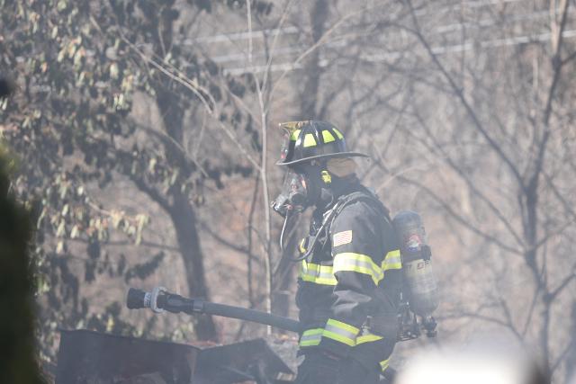 Alton Fire Department responds to a house fire in the 400 block of Jefferson Avenue.