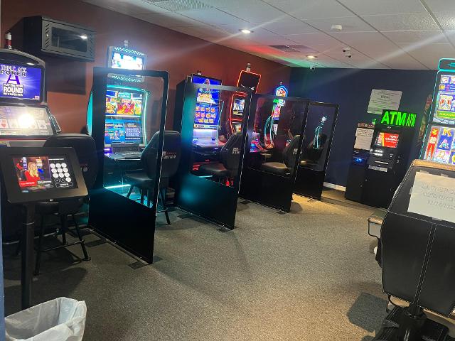 The store will feature gaming machines, a liquor store, and multiple laundry machines. 